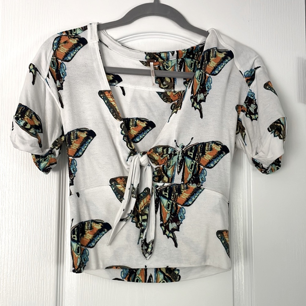 Free people butterfly top size small. Super cute top.